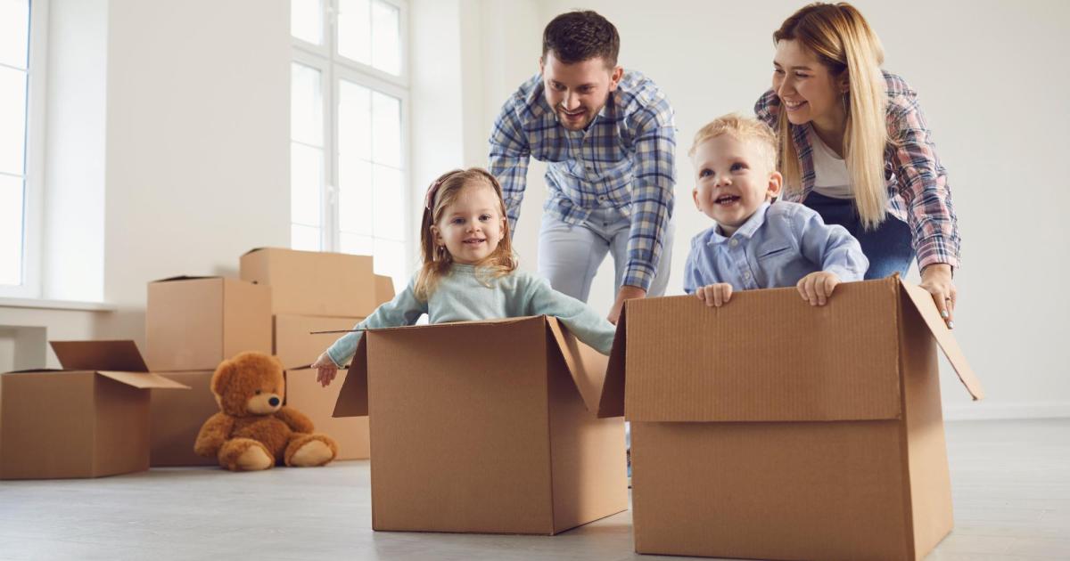 Children in cardboard boxes