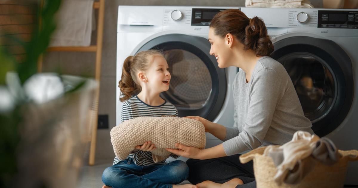 Mother and Daughter doing laundry