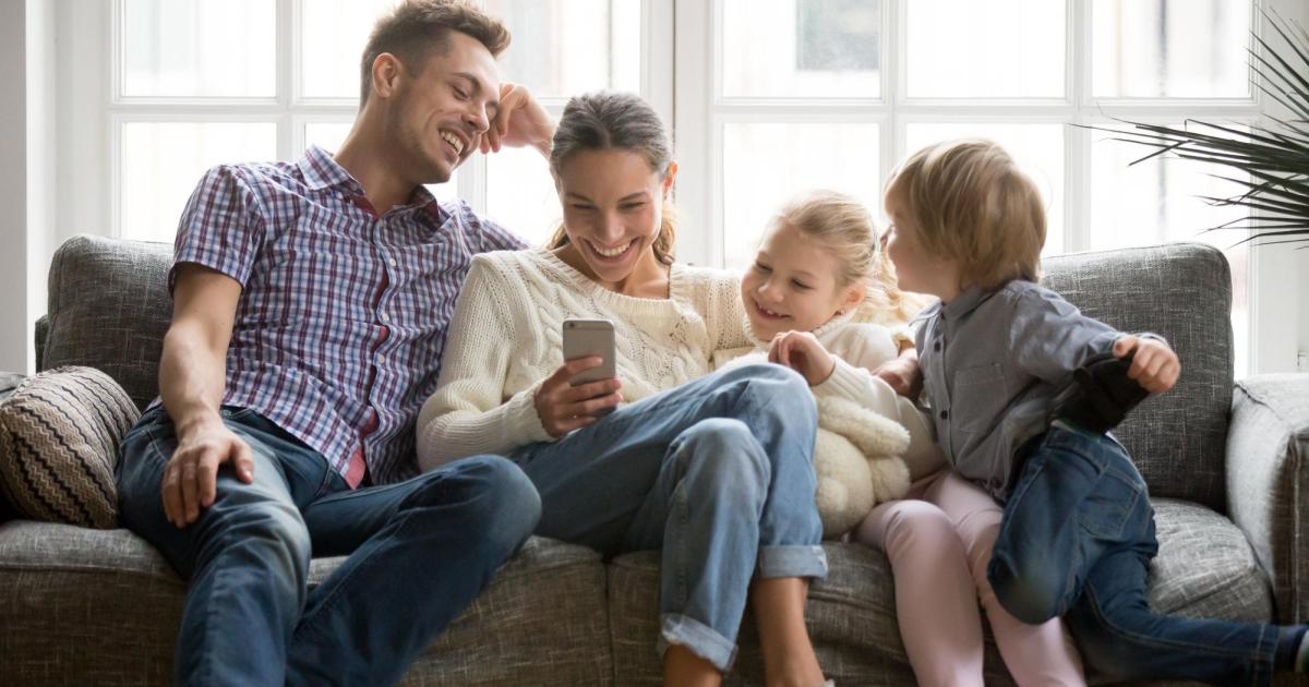 Family looking at phone